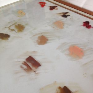 Mixing flesh tones in oil paint on glass palette
