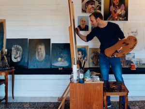 Portrait Artist Painting in Art Studio